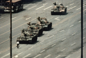 05 Jun 1989, Beijing, China --- A Beijing demonstrator blocks the path of a tank convoy along the Avenue of Eternal Peace near Tiananmen Square. For weeks, people have been protesting for freedom of speech and of press from the Chinese government. --- Image by © Bettmann/CORBIS